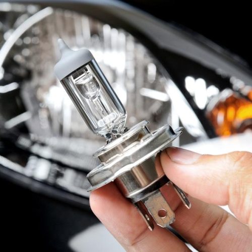 halogen light bulb H4 over black car